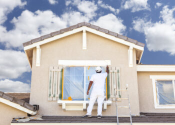 Muzyczna malujący elewację domu-resize.com